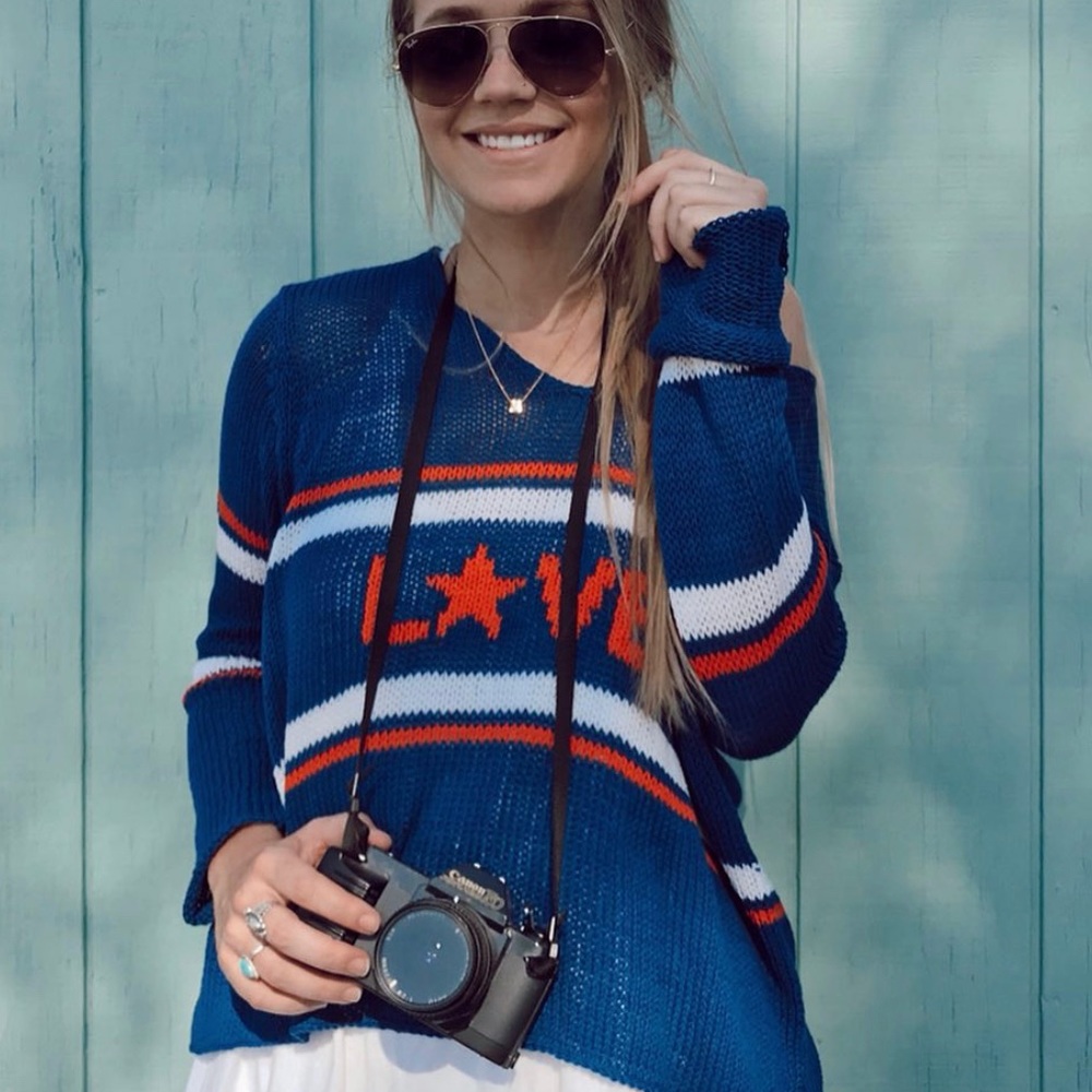 Love Wooden Ships By Paola Buendia sweater